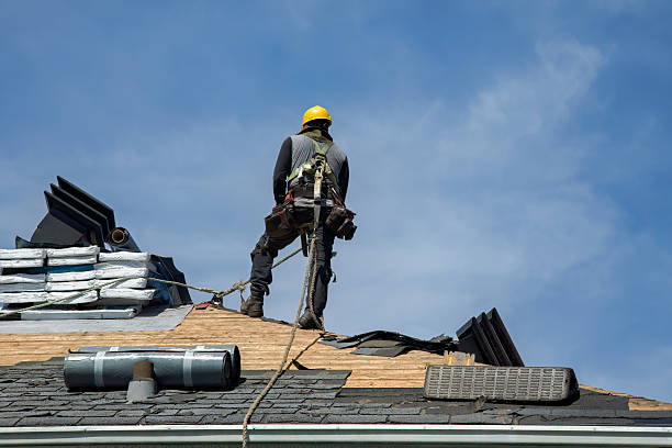 Professional Roofing technician working in Reedsville, WI